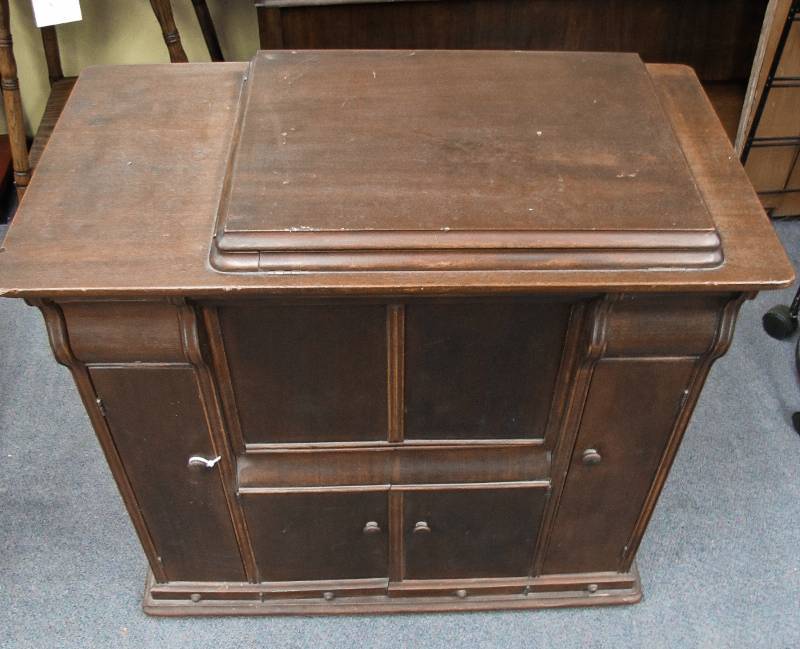 Vintage Singer treadle in unique cabinet