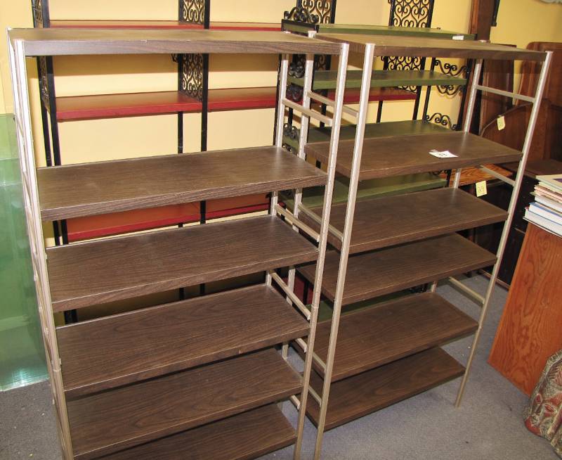 2 brown metal shelving