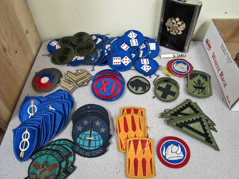 military patches and a flask