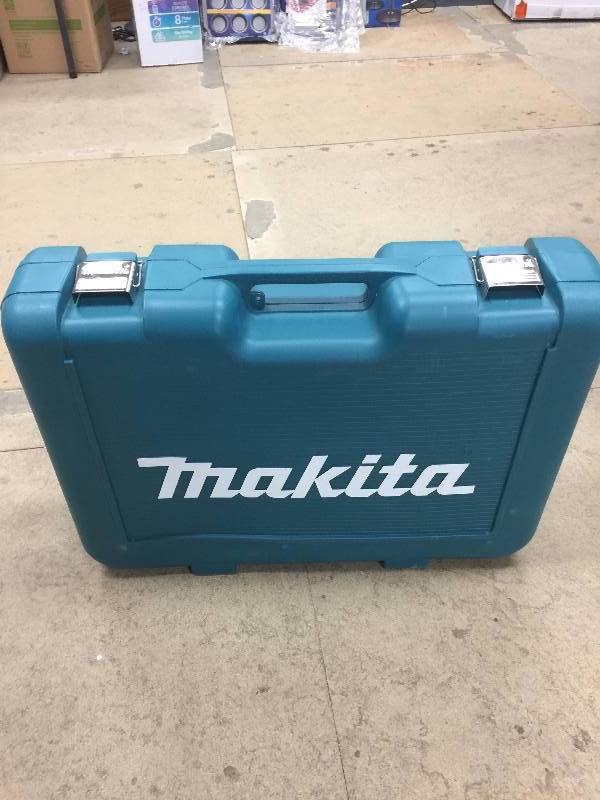 lot 49 image: Makita 10 Amp 1-916 in. SDS-MAX Rotary Hammer Model # HR4002 open box never used