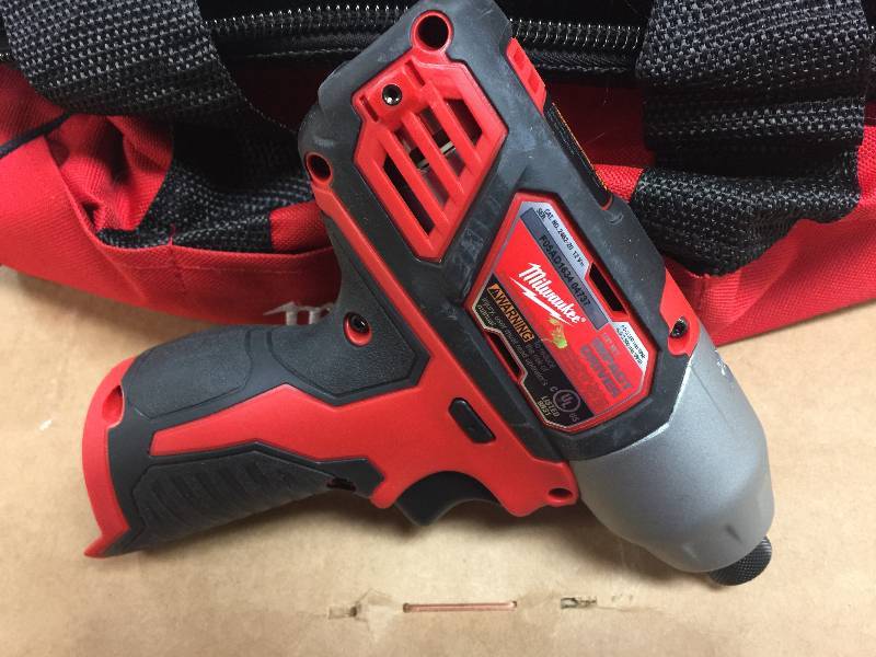 lot 29 image: Milwaukee M12 12-Volt Lithium-Ion Cordless 14 in. Hex Impact (Tool-Only) Model#  2462-20  Tool Only in working conditions