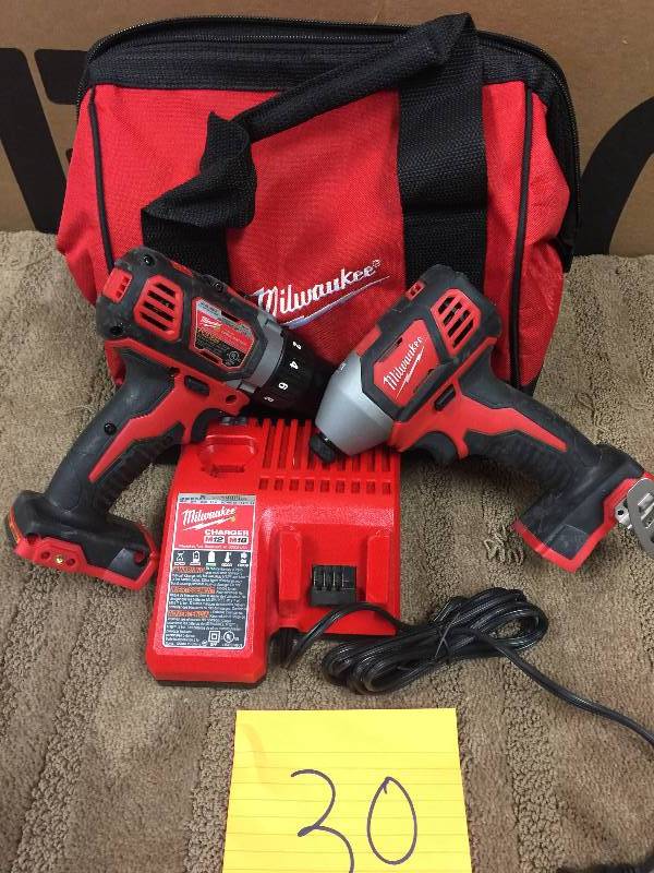 lot 30 image: Milwaukee M12 12-Volt Lithium-Ion Cordless Drill DriverImpact Driver Combo in working conditions  batteries are not includes
