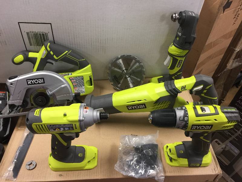 lot 40 image: Ryobi  5 Pc Tool set in working conditions Includes drill, 2.7 lbs. circular saw, 4.7 lbs. impact driver, 2.65 lbs. reciprocating saw, 4.1 lbs. JobPlus base, 2.15 lbs. 2 baterries and charger