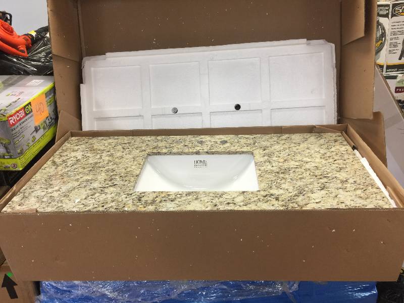 lot 58 image: Pegasus 49 in. W x 22 in. D Granite Vanity Top in Giallo Ornamental with White Single Trough Basin Model#  49886  shiping damage
