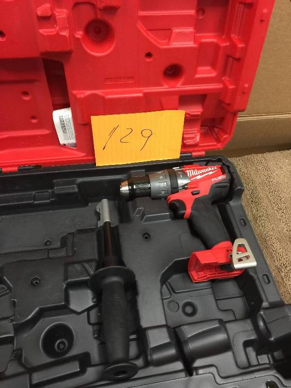 lot 129 image: Milwaukee M18 FUEL 18-Volt Lithium-Ion Brushless 12 in. Hammer DrillDriver (Tool-Only) Model#  2704-20  in working conditiones