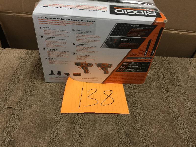 lot 138 image: RIDGID 12-Volt Hyper Lithium-Ion DrillDriver and Impact Driver Combo Kit Model # R9000K in like New working conditions