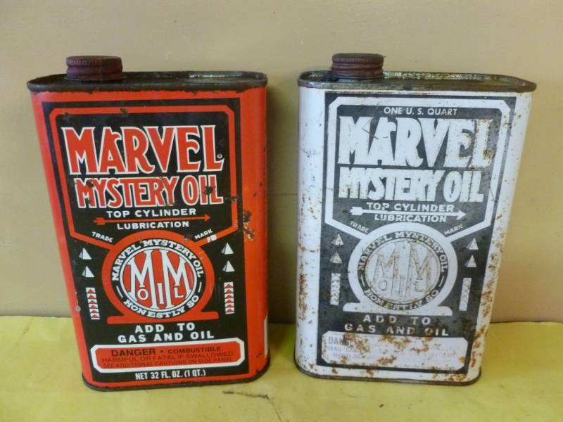 lot 185 image: Metal Oil Cans