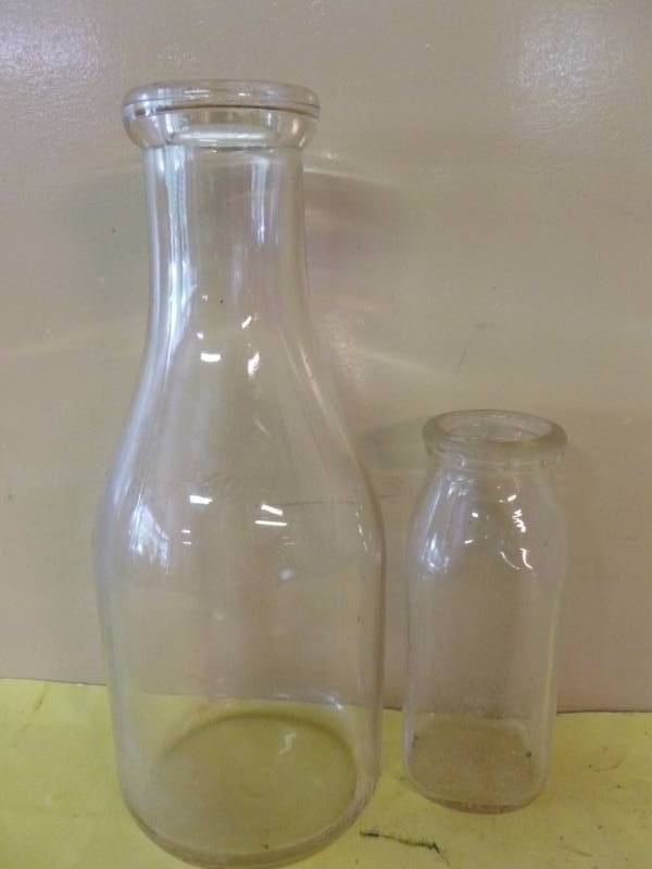 lot 211 image: Vintage Milk Bottles