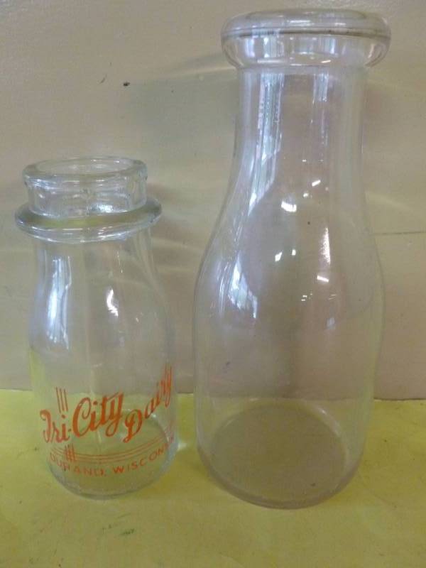 lot 218 image: Vintage Milk Bottles