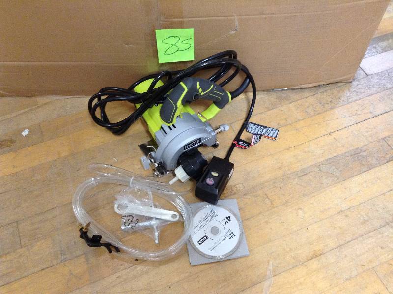 lot 85 image: Ryobi 4 Hand Held Tile Saw Never used