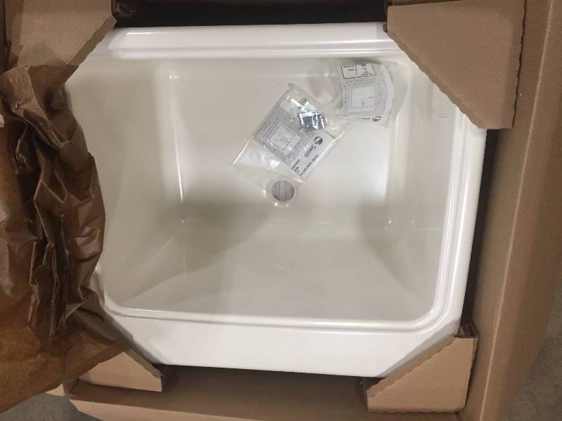 lot 5 image: Swan 25 in. x 22 in. x 13-916 in. Solid Surface Utility Sink Model # SSUS1000.018 open box never used
