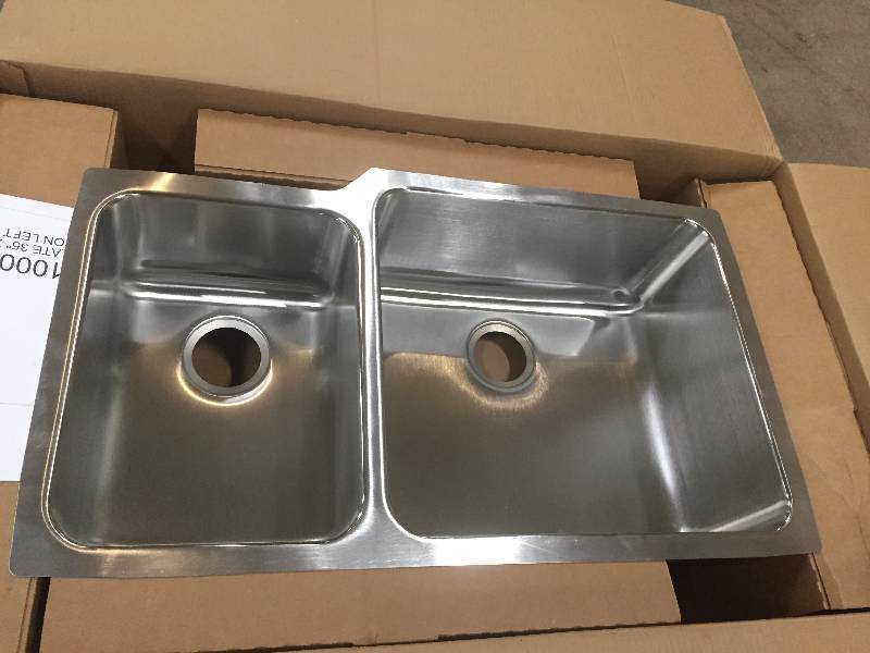 lot 16 image: Elkay Lustertone Undermount Stainless Steel 35 in. Double Bowl Kitchen Sink Model # ELUH3520L open box never used