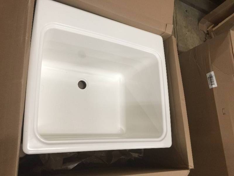 lot 24 image: Swan 25 in. x 22 in. x 13-916 in. Solid Surface Utility Sink open box never used