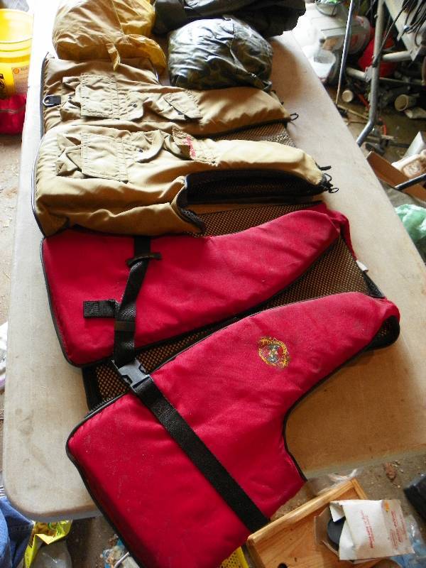lot 100 image: LIFE VESTS AND RAIN COAT