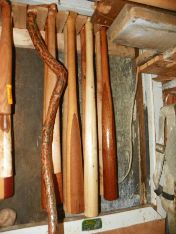 lot 25 image: HANDCRAFTED CANE AND WOODEN BATS