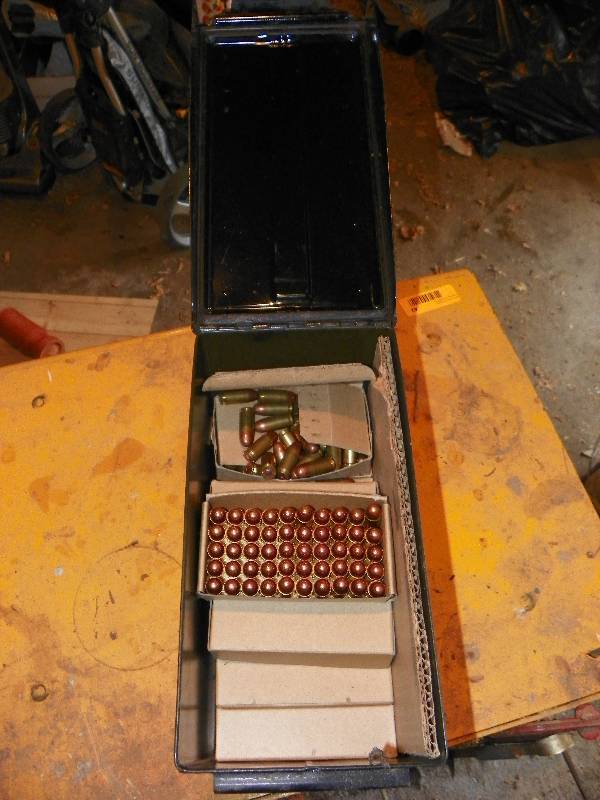 lot 45 image: METAL AMMO BOX WITH .45 CALIBER SHELLS