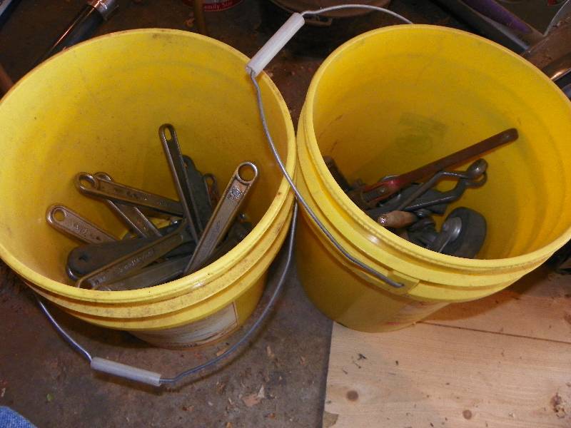 lot 85 image: 2 BUCKETS WITH WRENCHES AND CASTER WHEELS