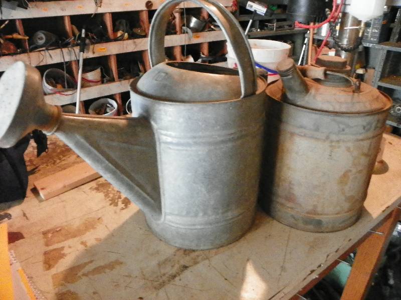 lot 86 image: METAL WATERING CAN AND GAS CAN