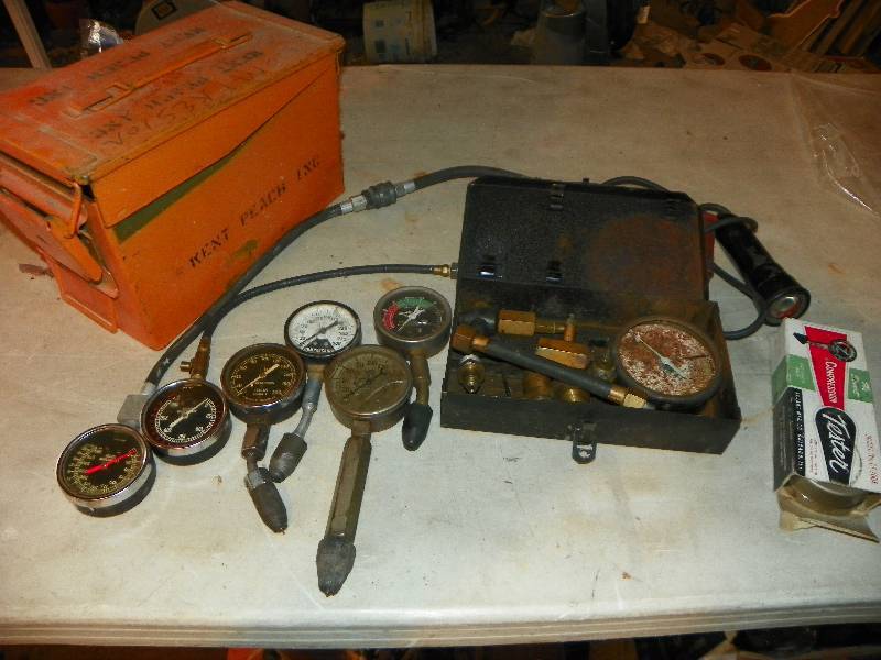 lot 105 image: ORANGE METAL AMMO BOX AND GAUGES