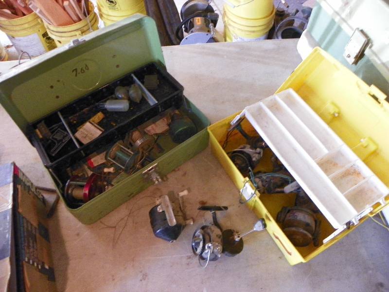 lot 134 image: TWO TACKLE BOXES WITH REELS AND MISC