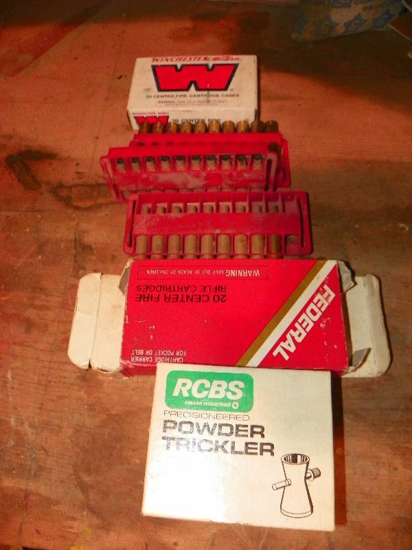 lot 215 image: EMPTY CENTER FIRE CASES AND POWDER TRICKLER