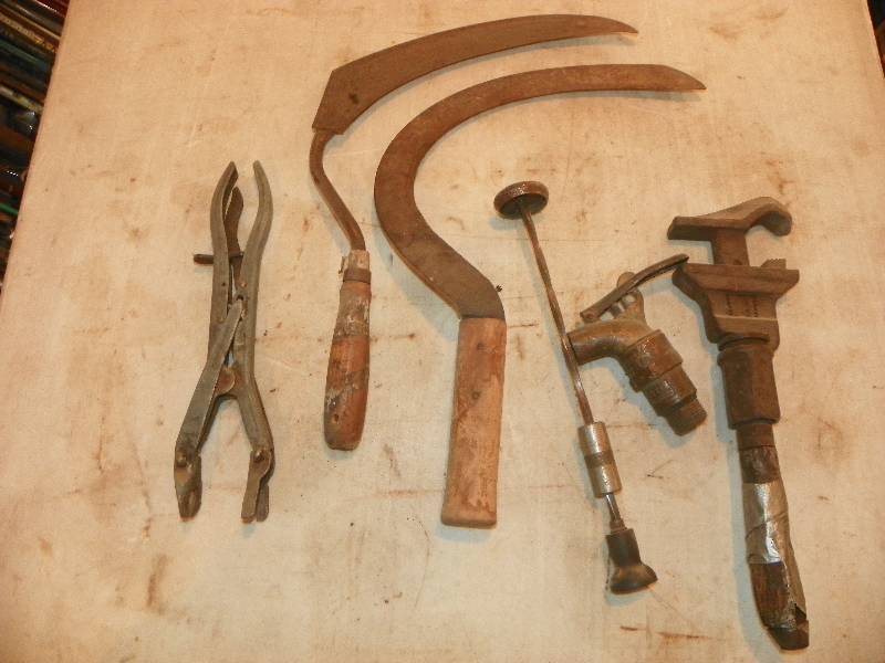 lot 310 image: OLD PIPE WRENCH, HAND SYTHES