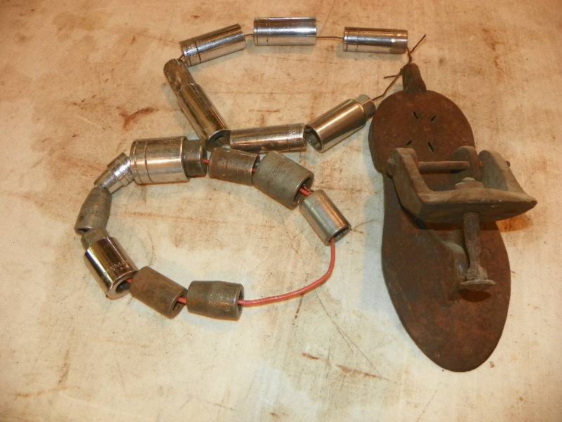 lot 318 image: SOCKETS AND OLD SHOE STRETCHER