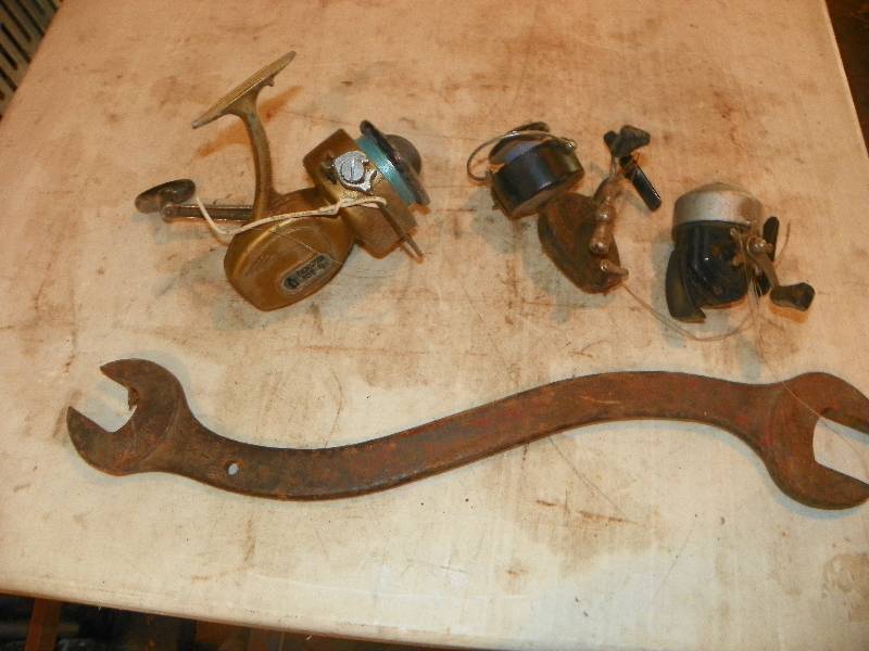 lot 322 image: FISHING REELS AND VINTAGE WRENCH