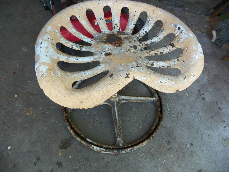 lot 353 image: ANTIQUE TRACTOR SEAT STOOL