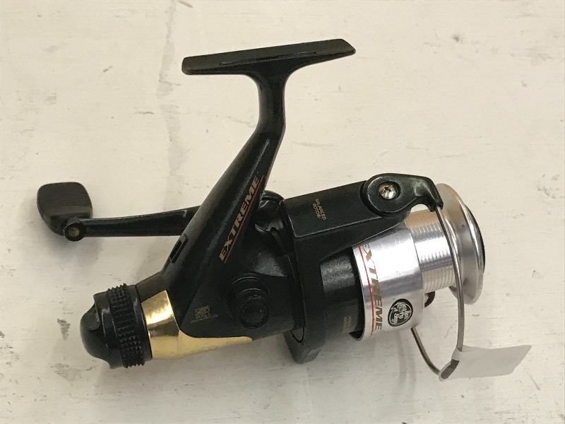 lot 11 image: Bass Pro Shops Extreme Spinning Ree...