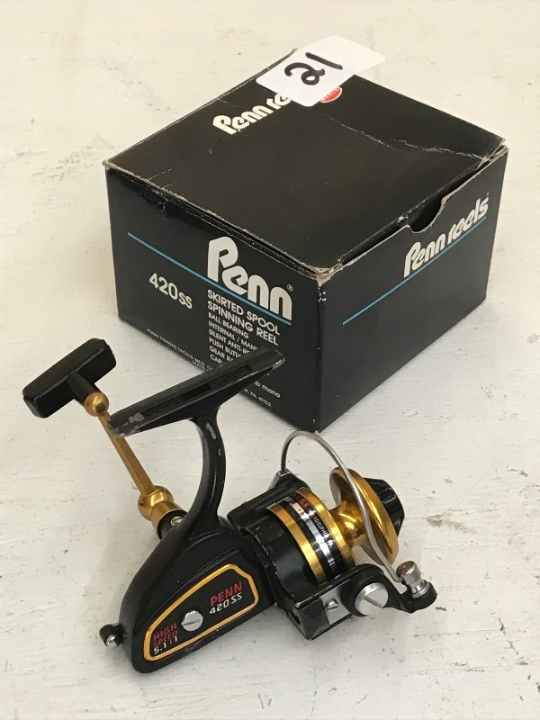 lot 21 image: Penn 420ss Skirted Spool Spinning R...