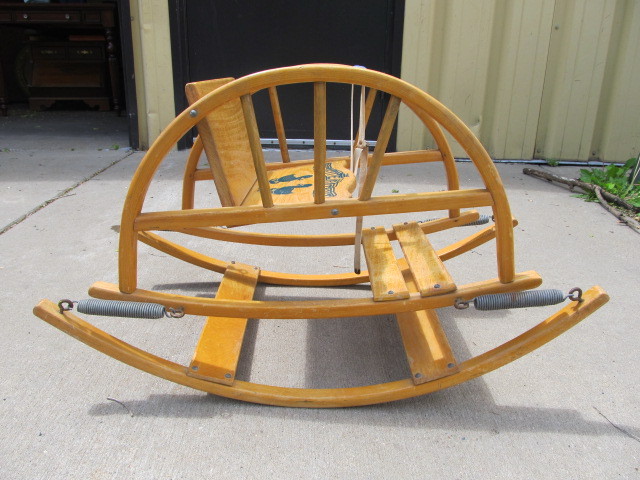 lot 67 image: Vintage The Teetertot Childs Wooden Rocker Chair