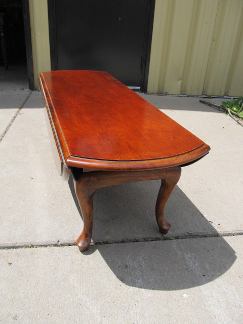 lot 61 image: Drop Leaf Cherry Wood Coffee Table