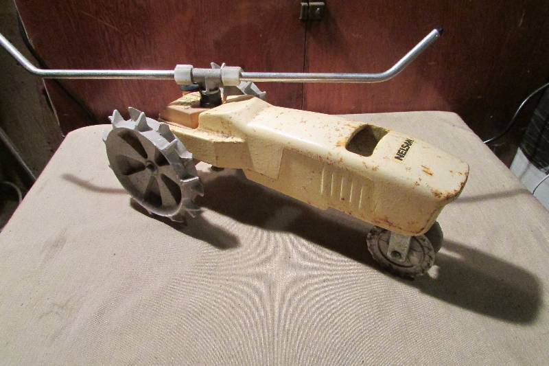 lot 62 image: Vintage Lawn Tractor Sprinkler