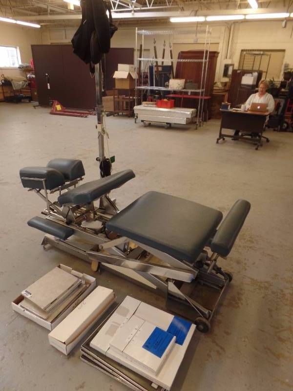 CHIROPRACTIC TABLE AND SUPPLIES