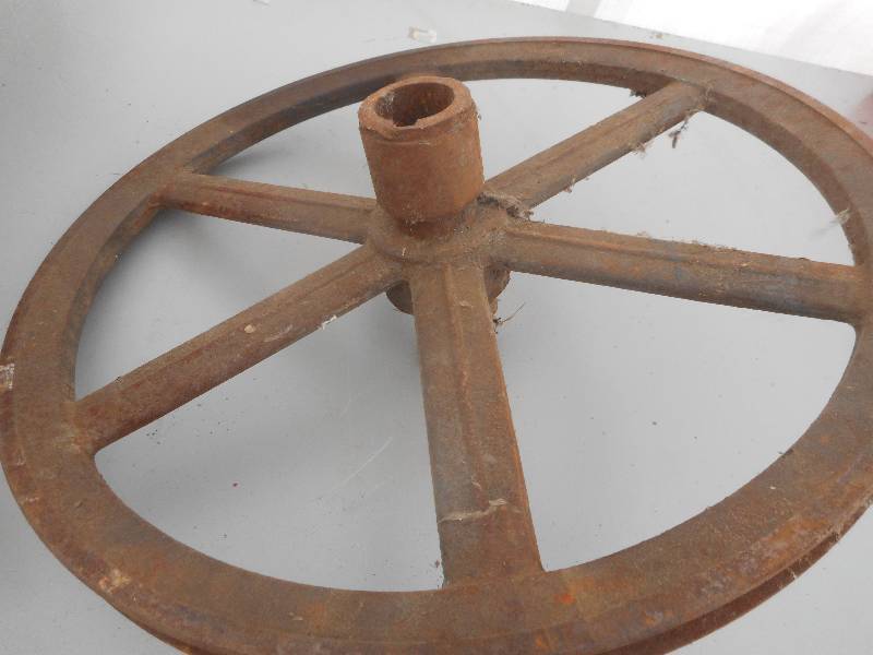 lot 50 image: ANTIQUE STEEL PULLYS