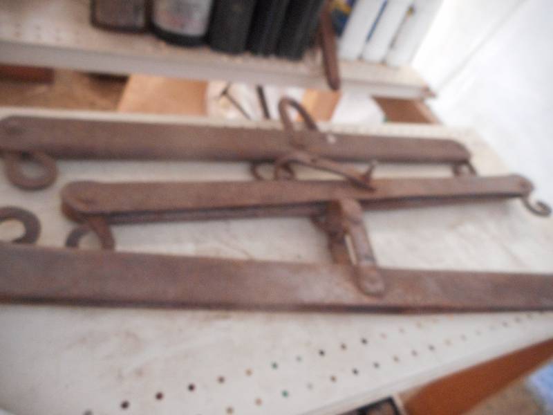 lot 103 image: 3 METAL HORSE LEVELERS