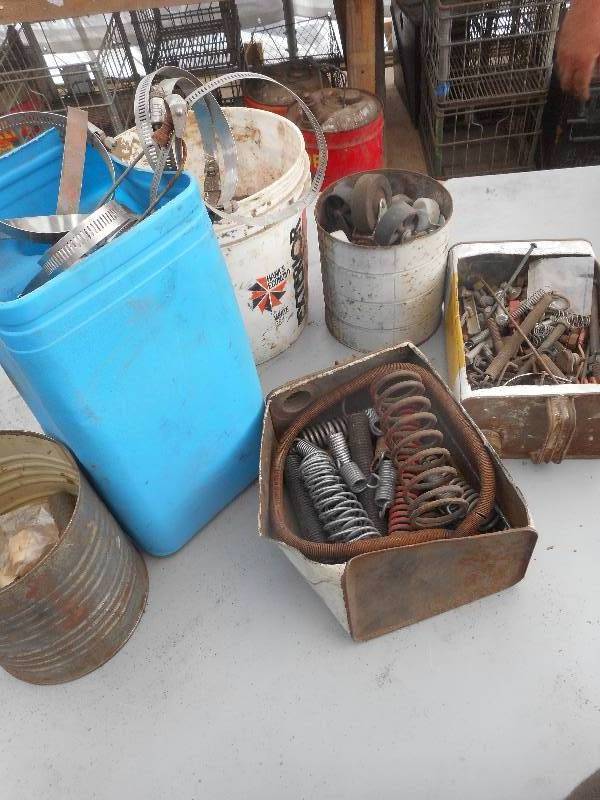 lot 262 image: SPRINGS WHEEL CASTER AND HOSE CLAMPS
