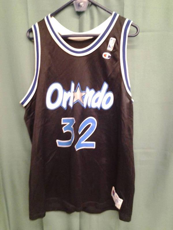 lot 9 image: Champion Jersey Size 48 Orlando #32 ONeal