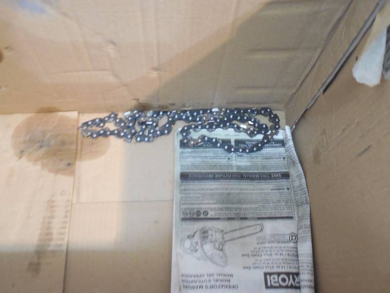 lot 31 image: Ryobi 14 in. 37cc 2-Cycle Gas Chainsaw