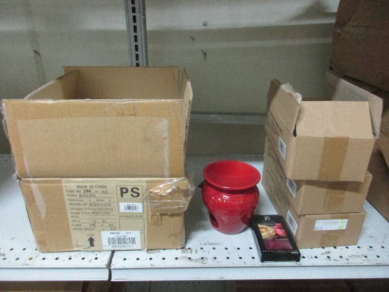 4 wax burners and 3 cases of wax