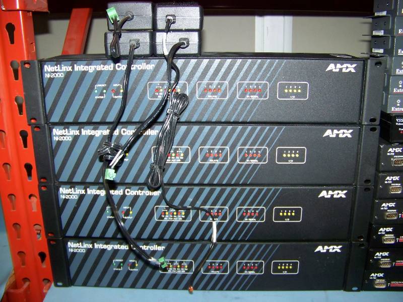 lot 71 image: (8 wide shelf) LARGE LOT of AMX, Extron Electronics, Polycom, Tandberg and ClearOne, Controllers  Volume Controls  Sensors  Teleconferencing Units and more