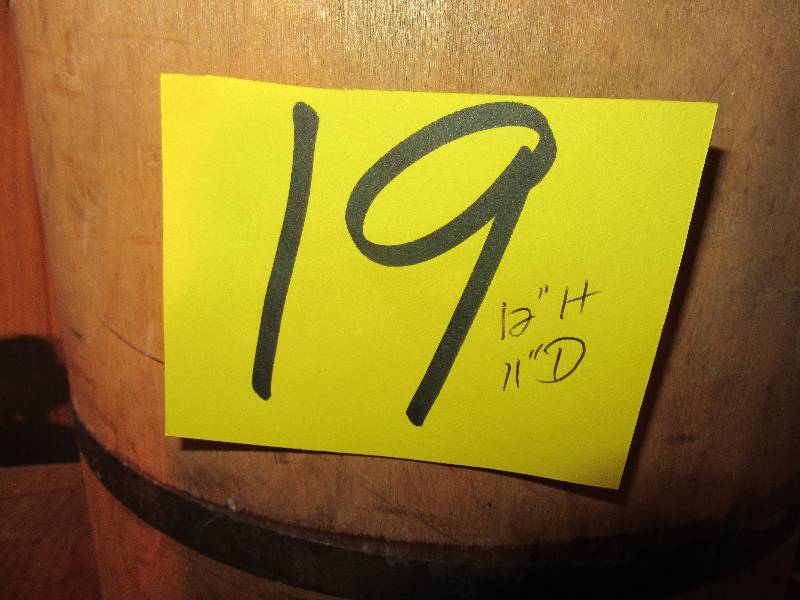 lot 19 image: 11 in Diameter x 12 in h. Wood barrel