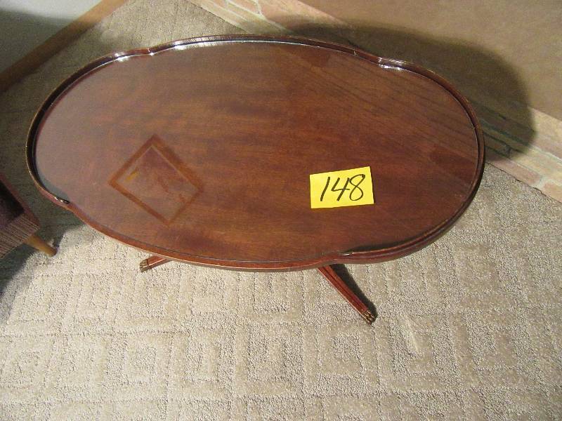 lot 148 image: Nice walnut raised edge, claw foot coffee table