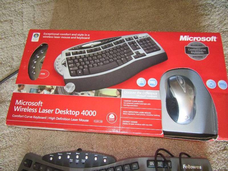 lot 158 image: 2 keyboards and mouse.. Comfort wrist rest