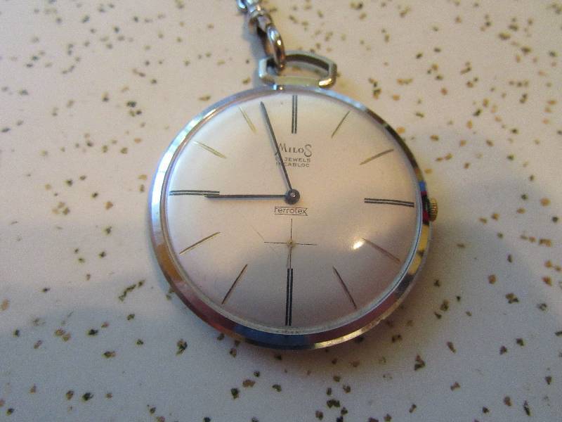 lot 167 image: MILOS Errotex pocket watch.. Appears to work.. We wound and it ran