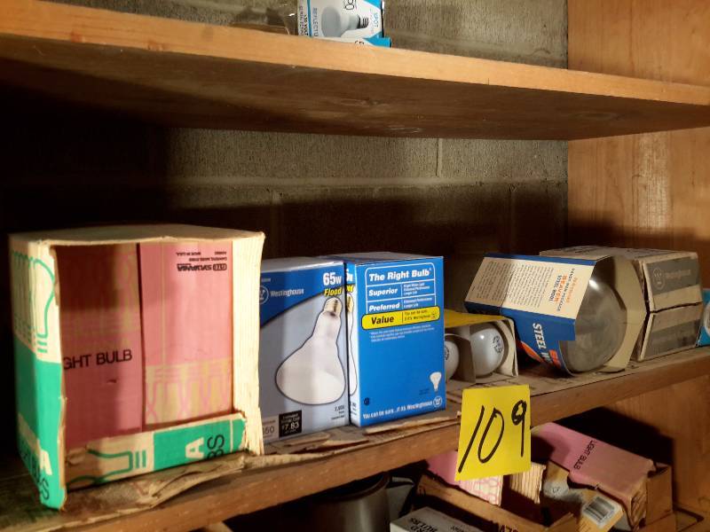 lot 109 image: Large lot of light bulbs on the basement shelf.. Bring your own boxes