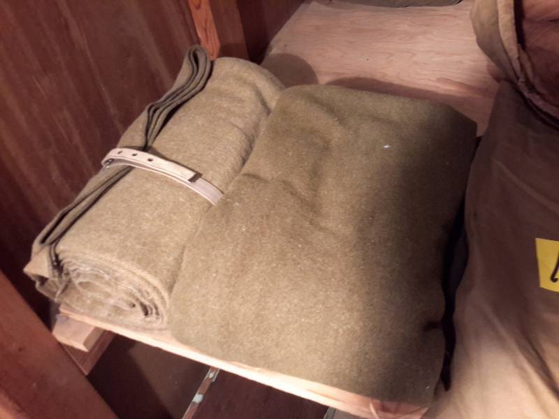 lot 119 image: 2 wool army blankets (one has some small holes on edge)  light weight sleeping bag