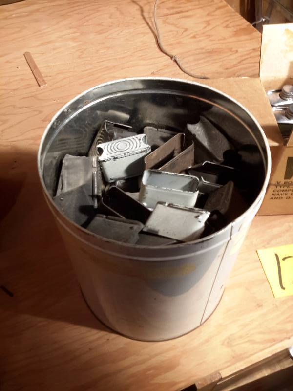 lot 122 image: Large lot of gun oil  M1 Cartridge Clips