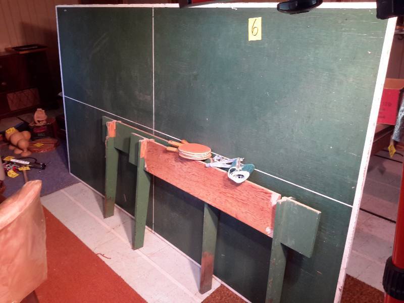 lot 6 image: Ping Pong table with wood legs as shown.. Paddles etc included